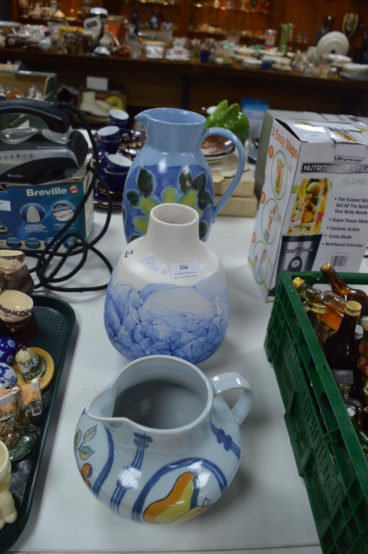 Three Pottery Vases and Jugs