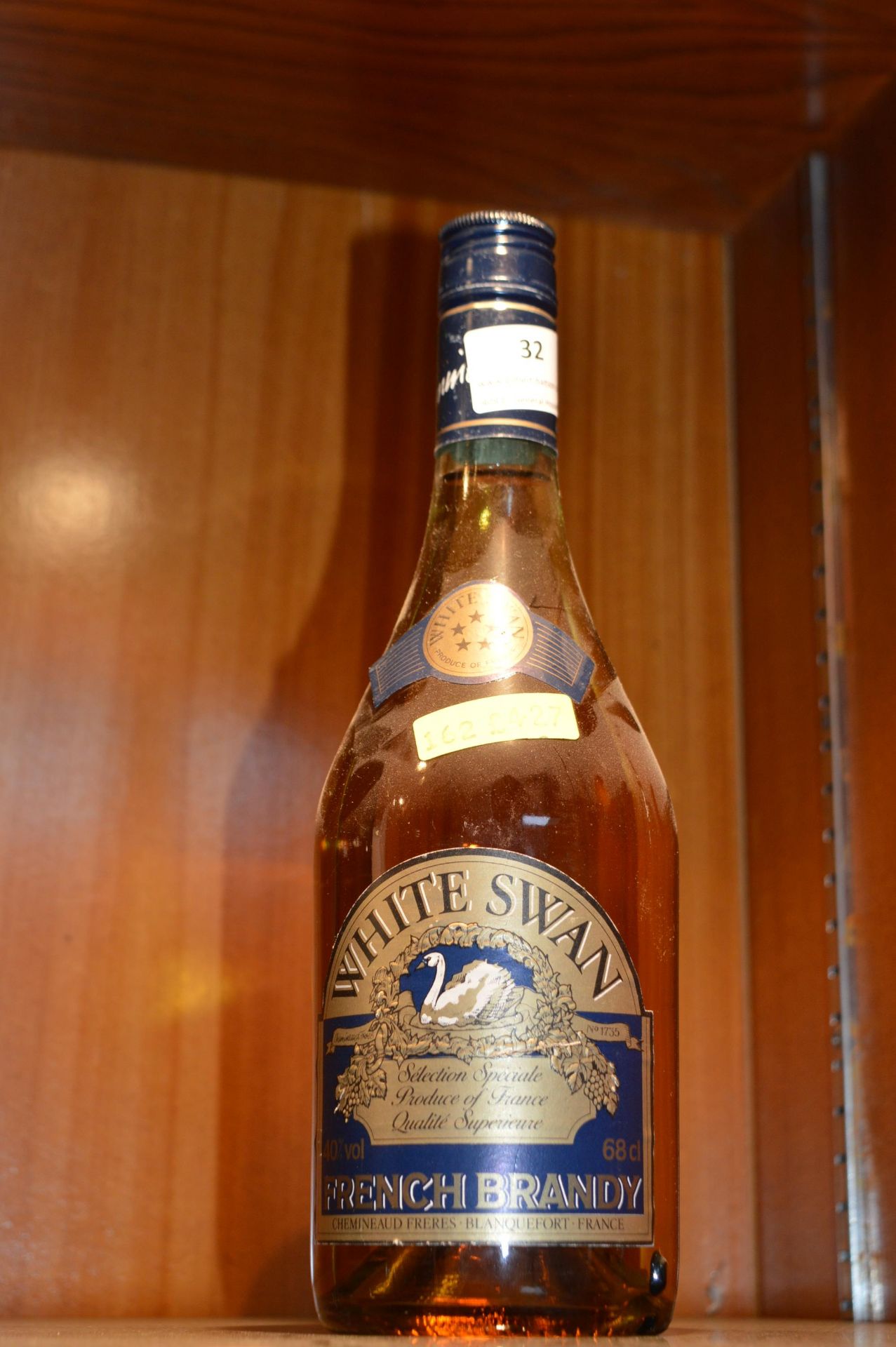 Bottle of White Swan French Brandy