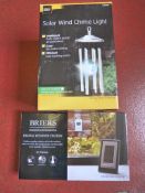 *Solar Wind Chime and a Digital Weather Station