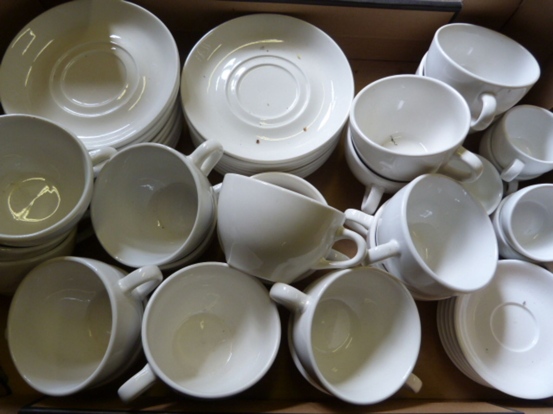 *Box of White Tea Cups and Saucers