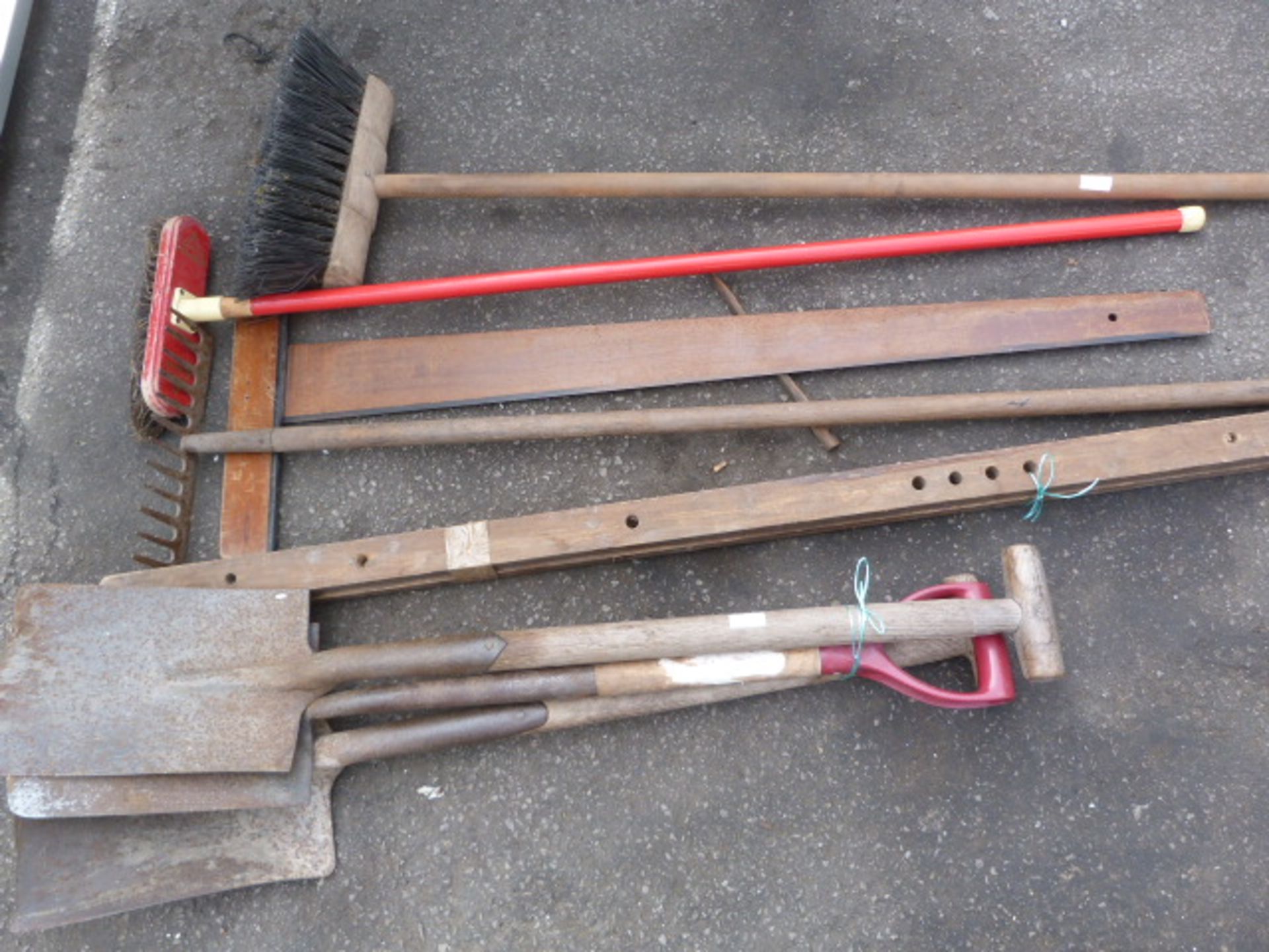 Bundle of Tools Including Spades, T-Square, Rake,