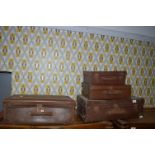 Four Vintage Suitcases