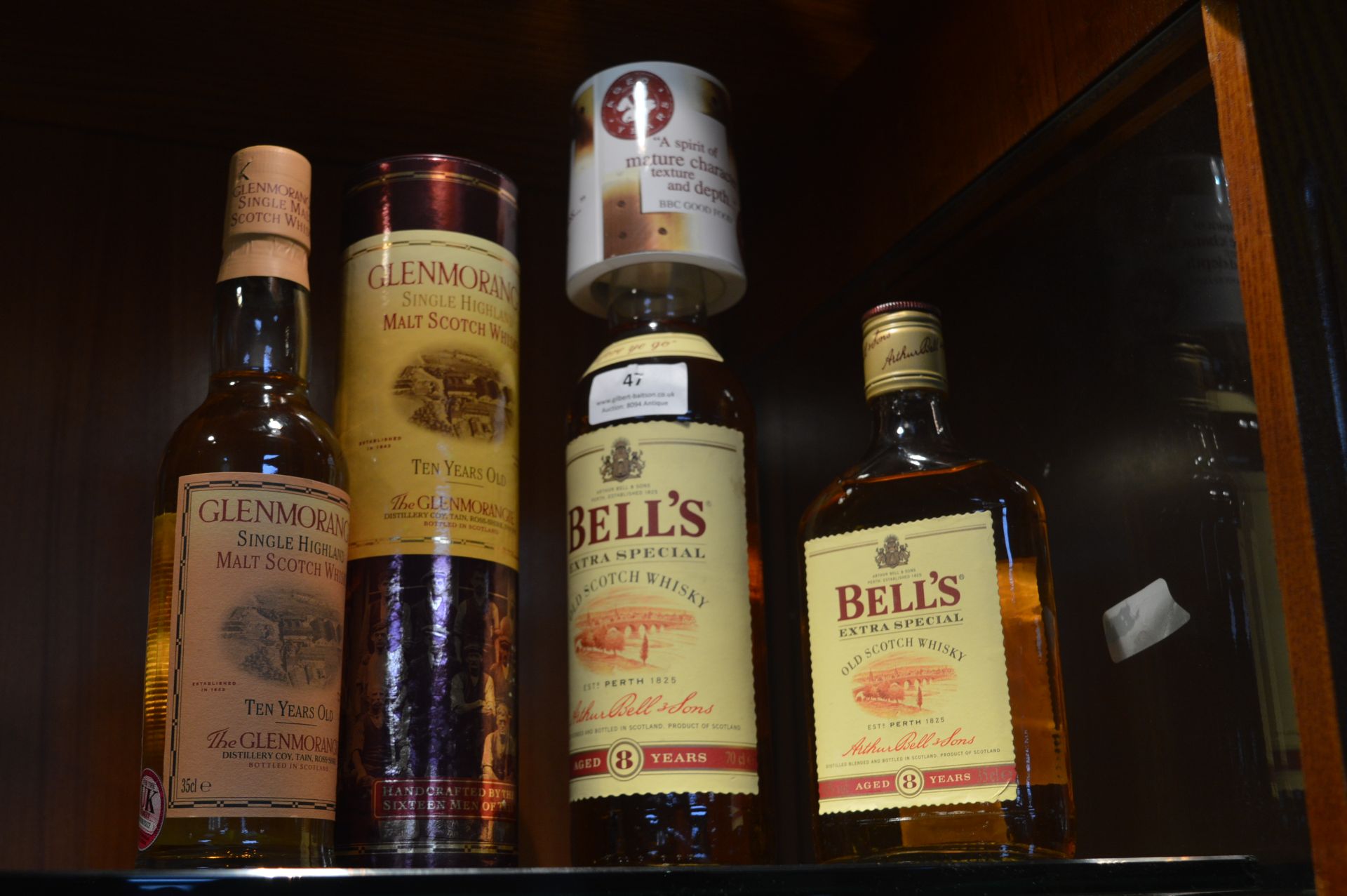 One and Half Bottles of Bells 8 Year Old Extra Special Scotch Whisky Plus 1/2 Bottle of Glenmorangie