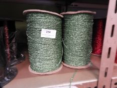 *Four Rolls of Green Metallic Thread