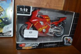 Three Boxed Diecast Model Motorcycles