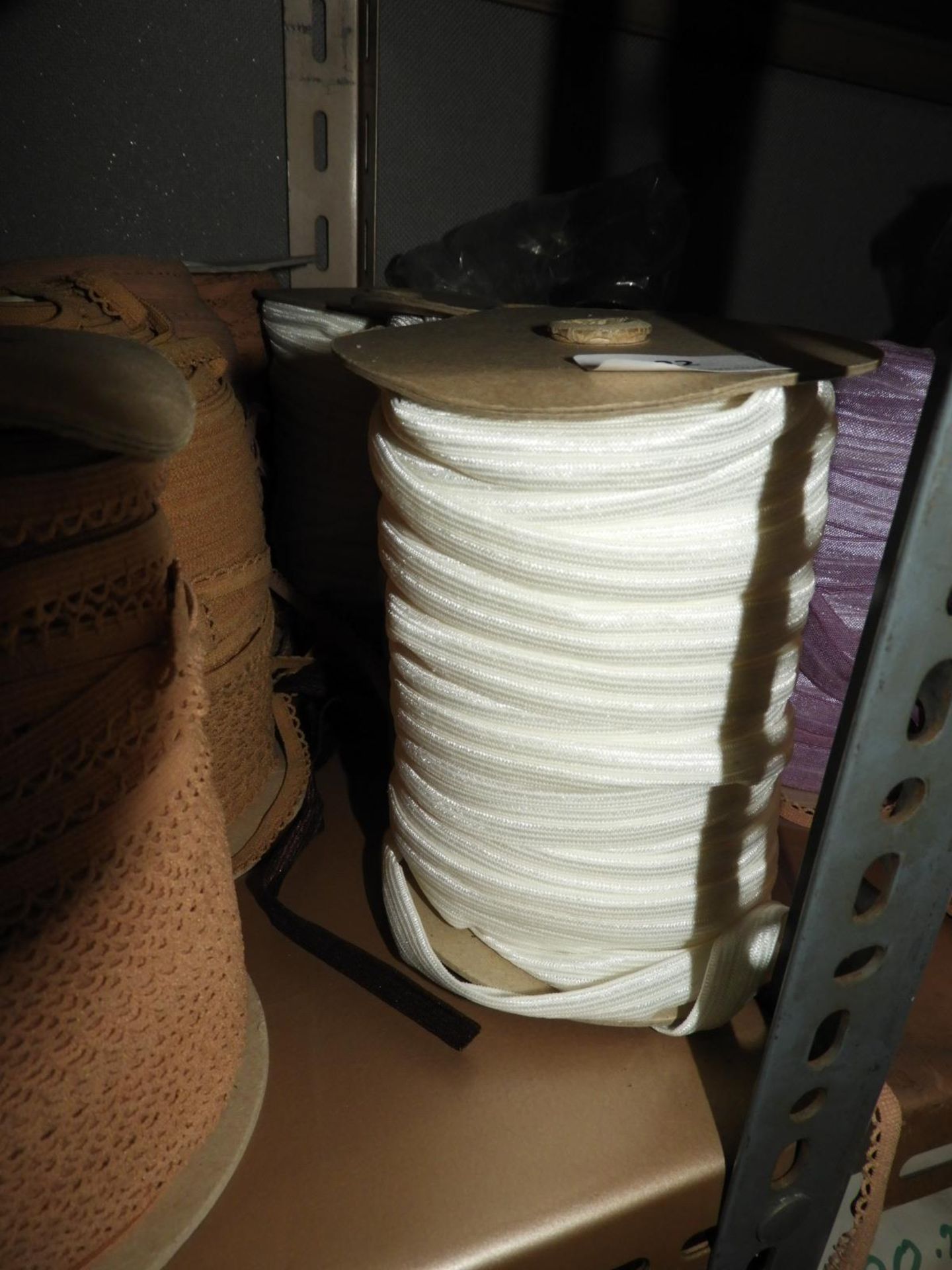 *Four Rolls of Elasticated Edging (As Per Photogra