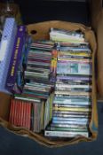 Box of CDs and DVDs