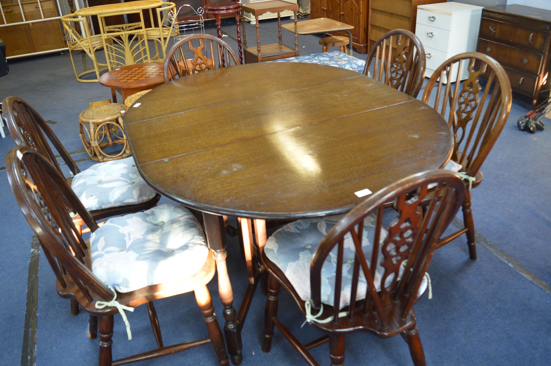 Dark Oak Oval Dining Table with Six Windsor Style