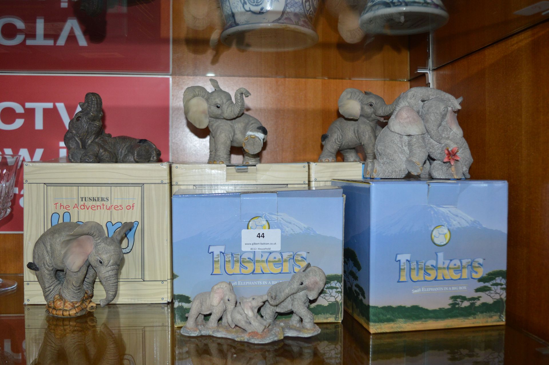 Five Boxed Tuskers Elephants and One Other