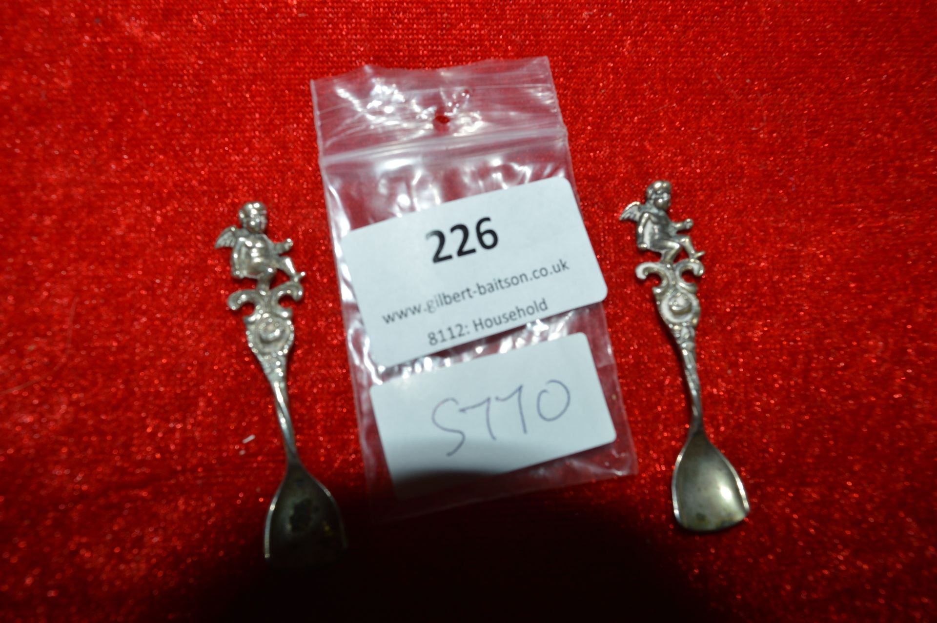 Pair of Continental Silver Spoons with Cherubs