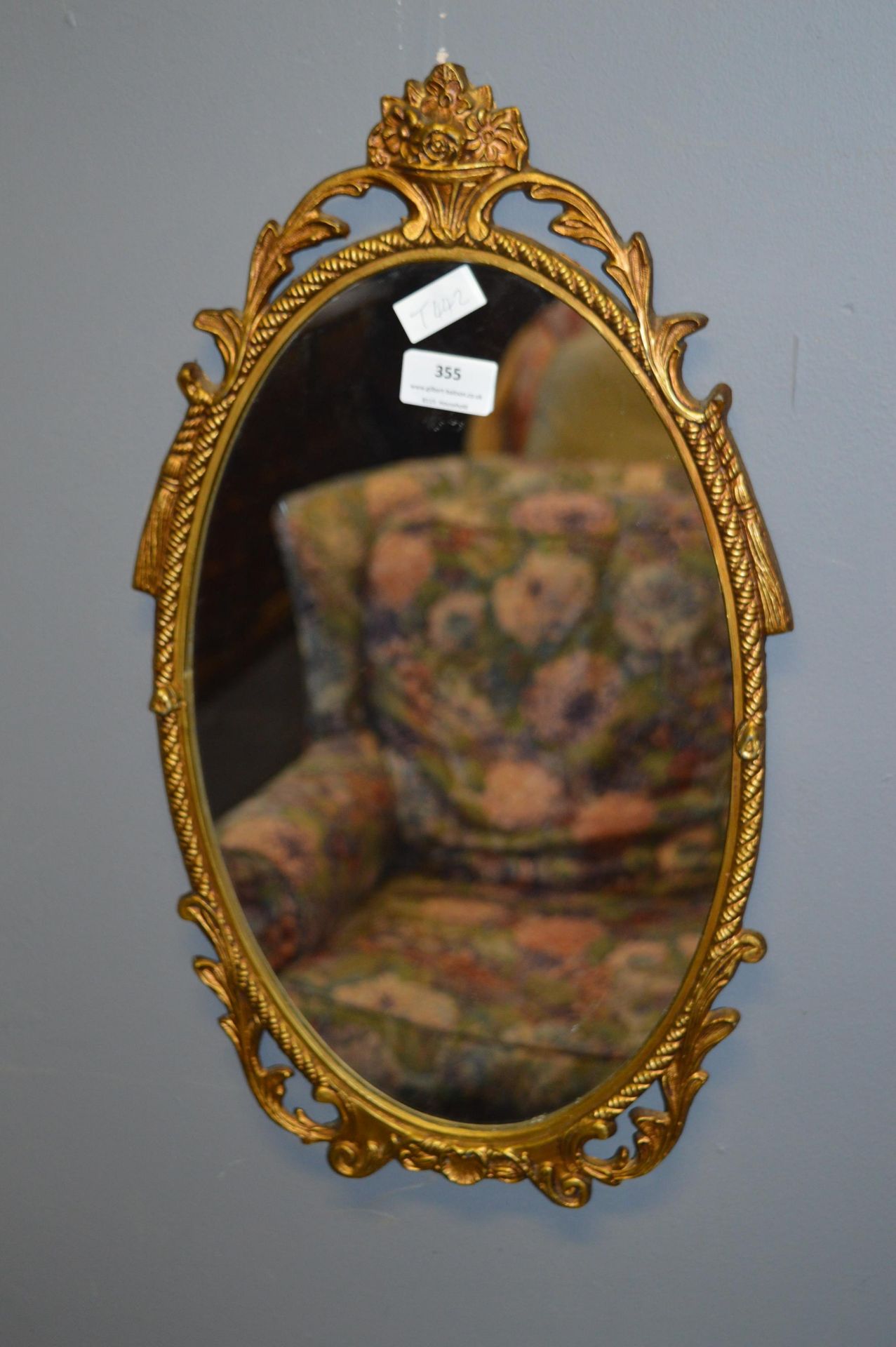 Oval Gilt Framed Wall Mirror with Swag Detail