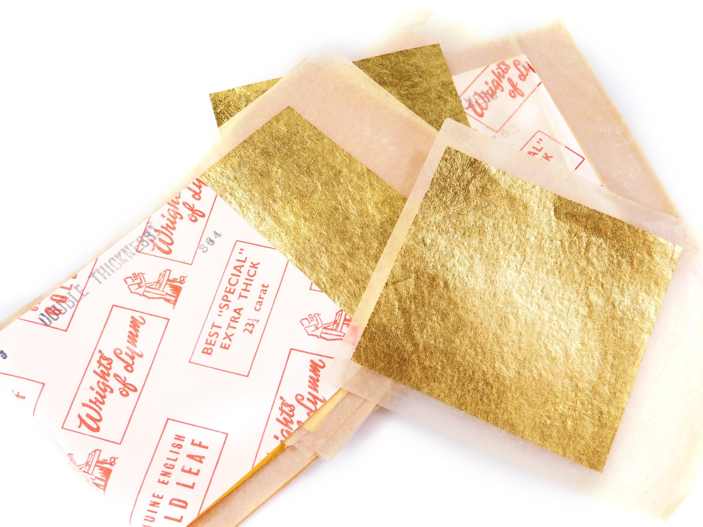 Various sheets of gold leaf, approx. 56, various advertising and hat labels, to include Thomas