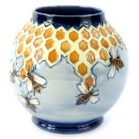 A Moorcroft Honeycomb pattern vase, designed by Philip Richardson, with tube lining by Lillian Leese