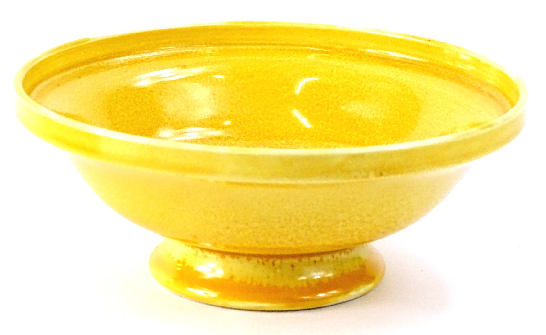 A Moorcroft Sunray pattern pedestal bowl or tazza, decorated with a plain mottled glaze, impressed