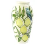 A Moorcroft lemon design vase, designed by Sally Tuffin in 1991, the paintress Barbara Mountford,