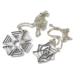 Two modern abstract silver pendants and chain, to include a silver six sided abstract pendant, on