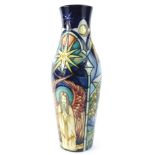 A Moorcroft vase, decorated with biblical scenes with Jesus, a fishing boat, the Garden of Eden