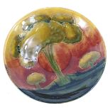 A Moorcroft Eventide pattern saucer, decorated with trees, with a red sky etc., impressed mark to