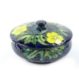 A Moorcroft Buttercup pattern covered bowl, designed by Sally Tuffin, with tube liner Alison Neal,