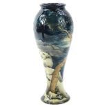 A Moorcroft trial vase, decorated with a coastal scene with trees etc., signed by Anji Davenport,