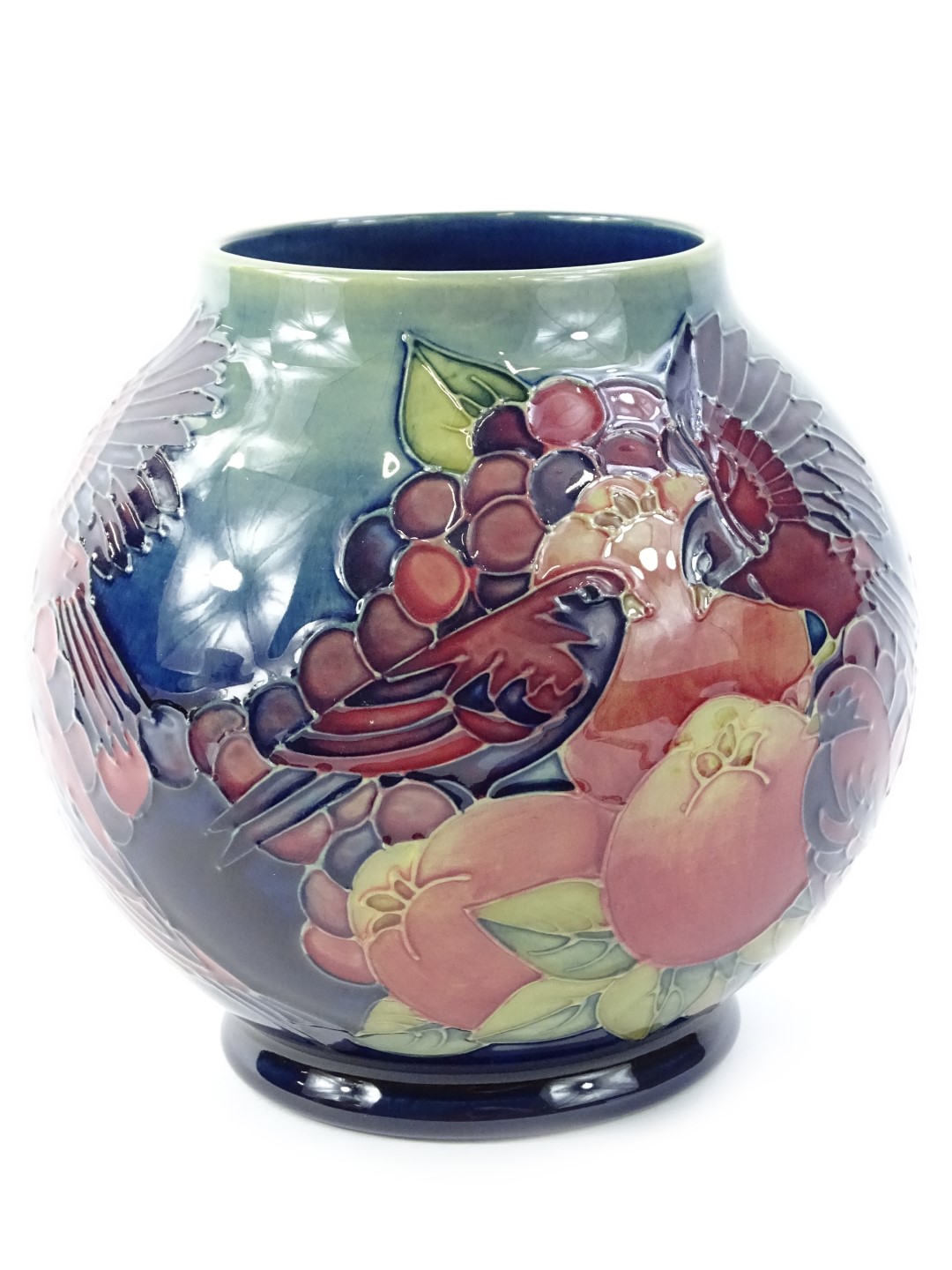 A Moorcroft Finch vase, designed by Sally Tuffin, with tube lining by Joyce Keeling and the