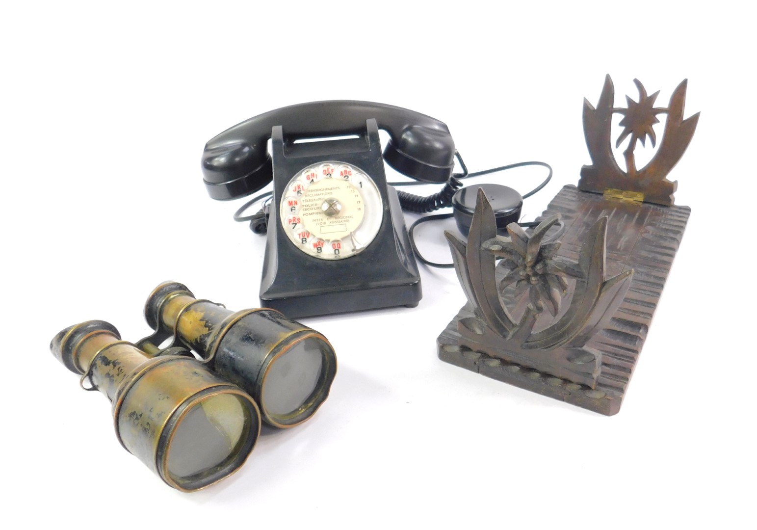 A French PTT black bell telephone, Swiss Alpine book slide carved with Edelweiss, 31cm L, and a pair