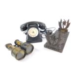 A French PTT black bell telephone, Swiss Alpine book slide carved with Edelweiss, 31cm L, and a pair