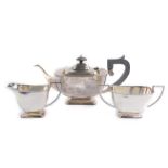 A silver three piece tea set, comprising teapot, cream jug and sugar bowl, maker BRS, Sheffield