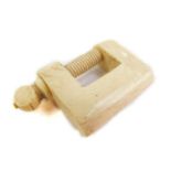 A Victorian ivory sewing clamp, 5cm H.