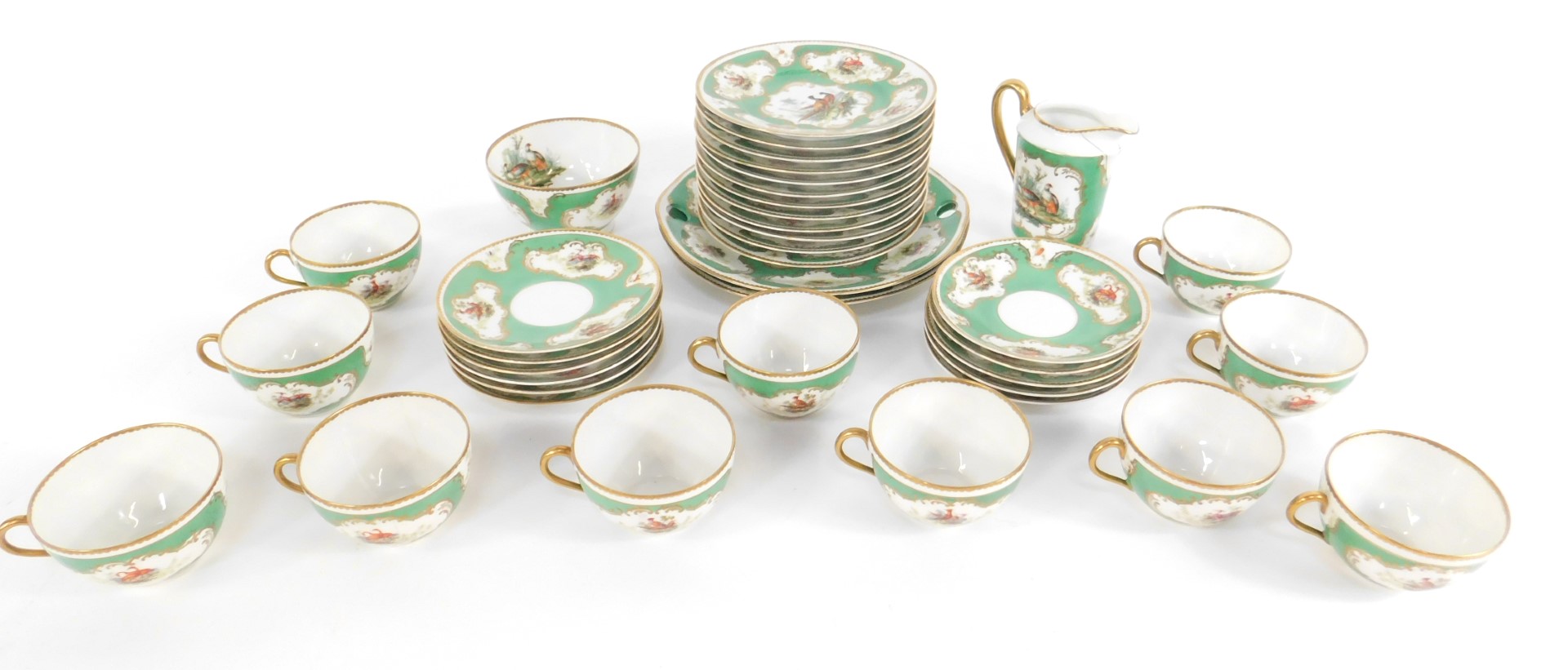 An early 20thC continental porcelain tea service, decorated with vignettes of Chelsea birds