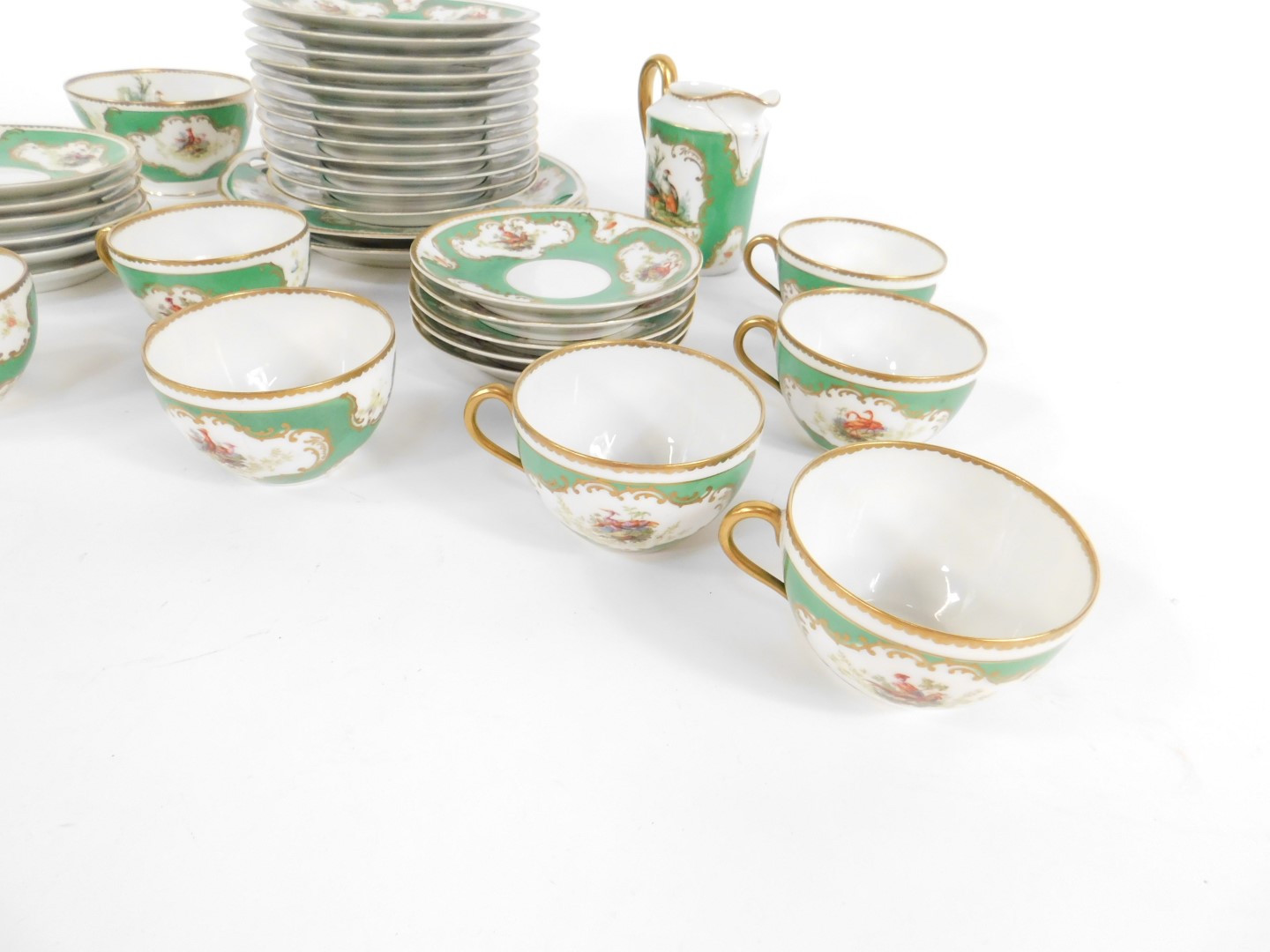 An early 20thC continental porcelain tea service, decorated with vignettes of Chelsea birds - Image 2 of 4