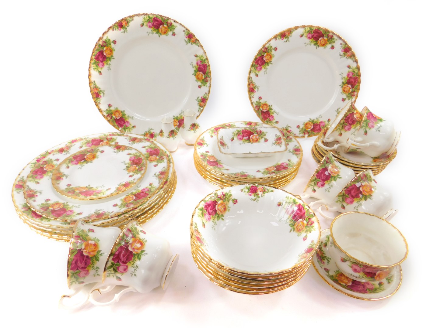 A Royal Albert porcelain part dinner and tea service decorated in the Old Country Roses pattern,