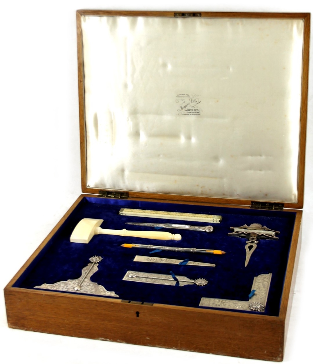 A George V silver and ivory Masonic Lodge tool set, by Toye & Co, comprising various tools, ruler,