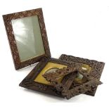 A collection of carved oak frames, to include two Art Nouveau style, one with Celtic devices etc.,