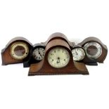 A collection of six mantel clocks and timepieces, to include three with Westminster chimes, in oak
