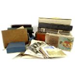 A quantity of early 20thC postcards, cuttings, photographs, cigarette cards, etc.