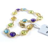 A Coloured Rocks bracelet, with an arrangement of blue, purple, yellow, orange and green stones,
