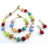 A Bellissi Murano glass jewellery set, comprising necklace, bracelet and drop earrings, in