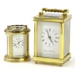 Two modern brass carriage timepieces, one bearing the label for Lepee France, in oval case, the