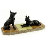 A French Art Deco spelter and marble mantel ornament, cast in the form of two German Shepherds or