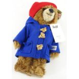 A Steiff Paddington bear, with original label, gold button etc.