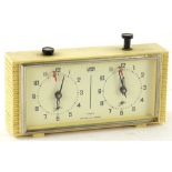 A Wega Russian chess clock, in cream Bakelite case, 22cm W.Provenance: This timepiece formed part of