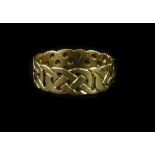 A 9ct gold dress ring, of cross and pierced design, ring size Y, 5.1g all in.