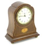 An Edwardian mahogany and marquetry mantel timepiece, the white enamel dial stamped Mandah, Rhodes