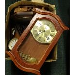 A collection of various wall and other clocks, to include a wooden cased example carved in the