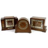 Three oak mantel clocks, two Art Deco period examples with Arabic numerals etc., one bearing