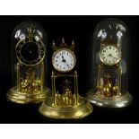 Three brass anniversary clocks, to include an example stamped Kunde, with black dial, another