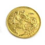 A George V 1911 full gold sovereign.