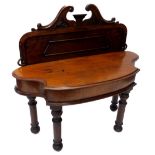 A Victorian mahogany hall table, the raised back with swan neck pediment, with panelled central