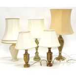 A collection of five onyx table lamps, to include a green and brown baluster shaped example, with